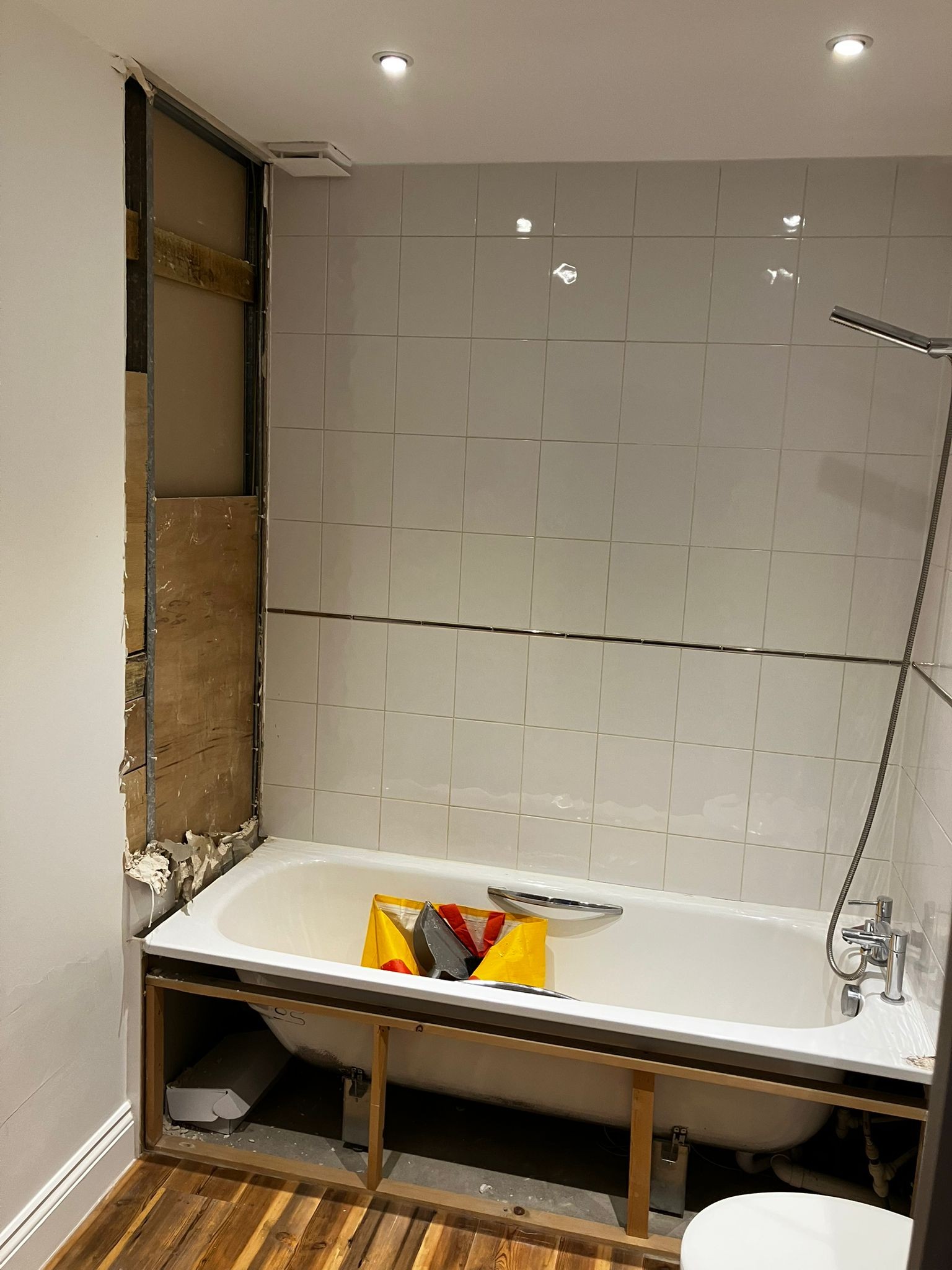 Before: Half-demolished bathroom