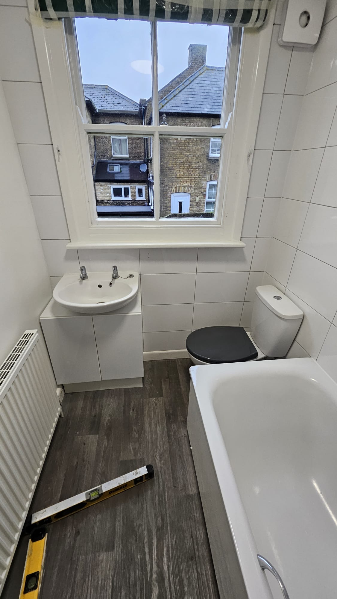 Before: Dated bathroom